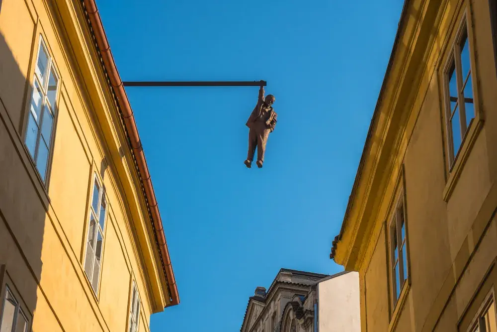 man-hanging-out-by-famous-czech-sculptor